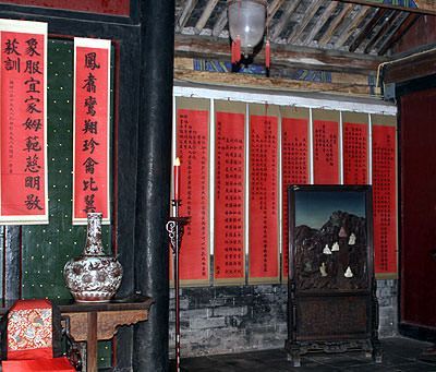 Room full of wall scrolls in the home of Confucius